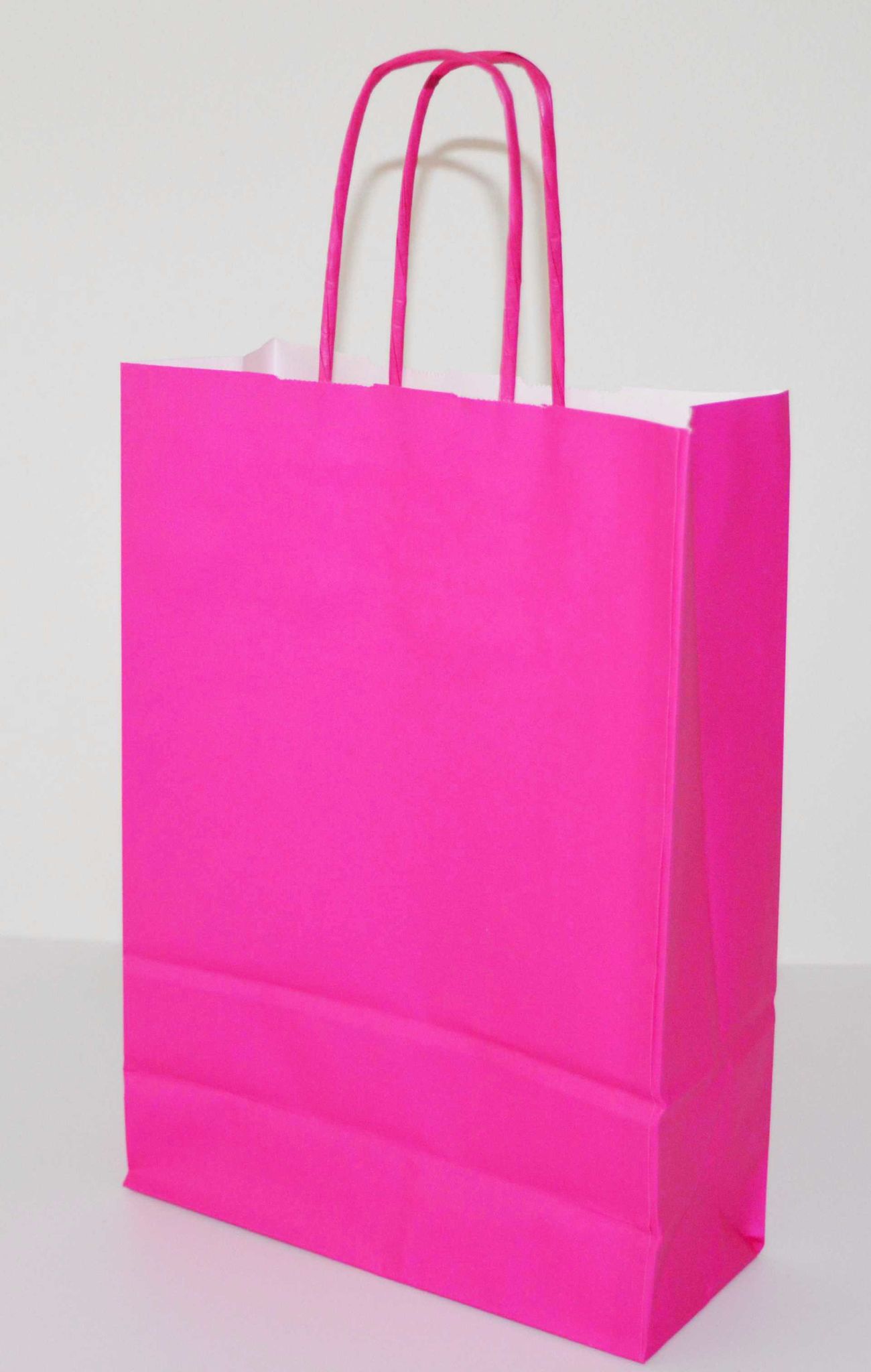 Pap�rov� ta�ka o rozm�ru 180 x 80 x 250 mm, r��ov� kraftov� pap�r, kr.pap.dr�adla